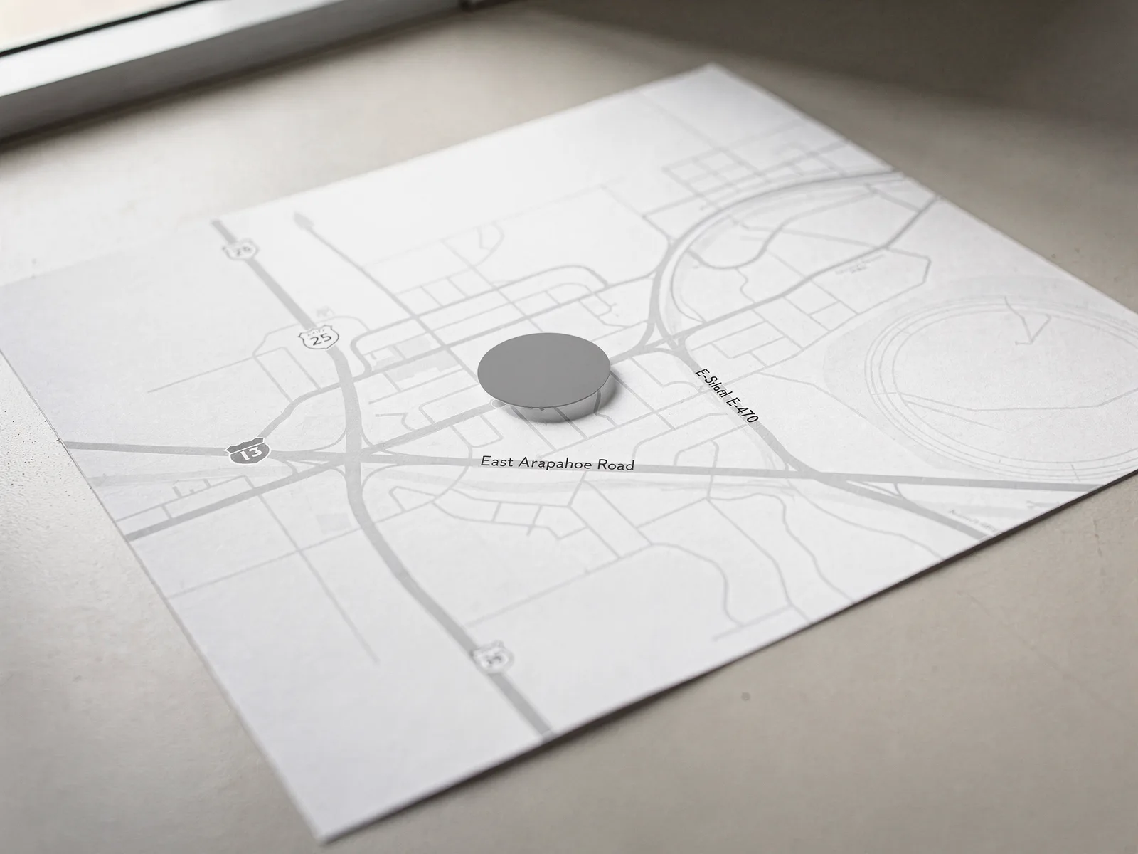 Simple street map showing a dealership marked on East Arapahoe Road between I-25 and E-470